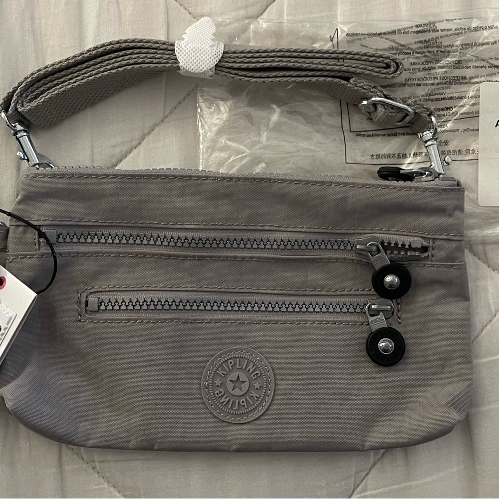 **FLASH  SALE** 
KIPLING Brand New Never worn Grey Crossbody..NWT